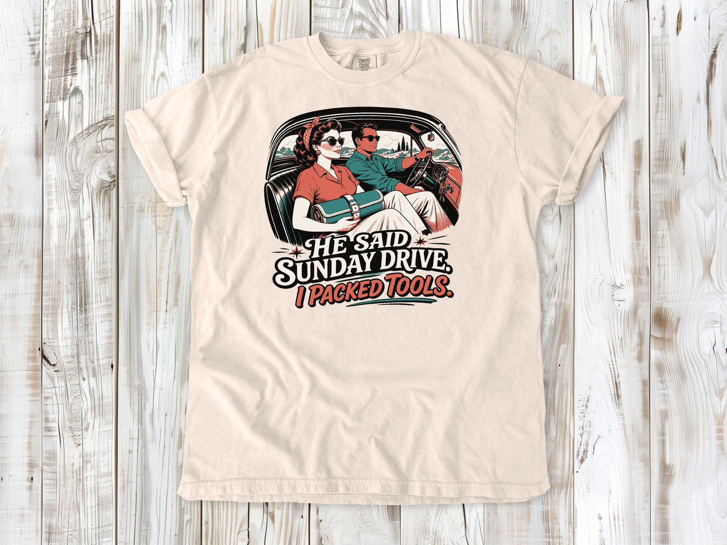 Ivory garment-dyed tee with He Said Sunday Drive I Packed Tools classic car graphic.