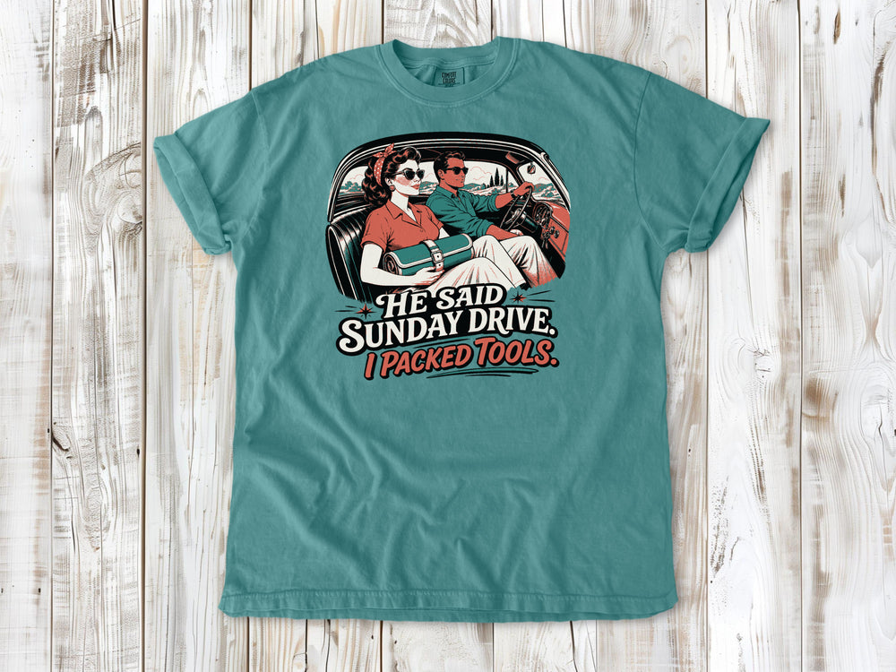 Seafoam garment-dyed tee with He Said Sunday Drive I Packed Tools classic car graphic.