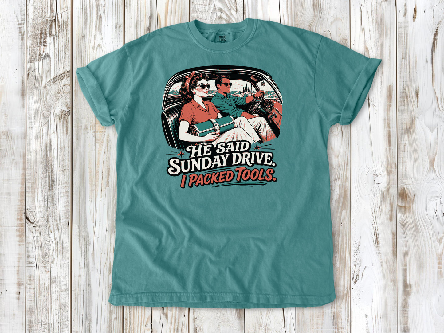 Seafoam garment-dyed tee with He Said Sunday Drive I Packed Tools classic car graphic.