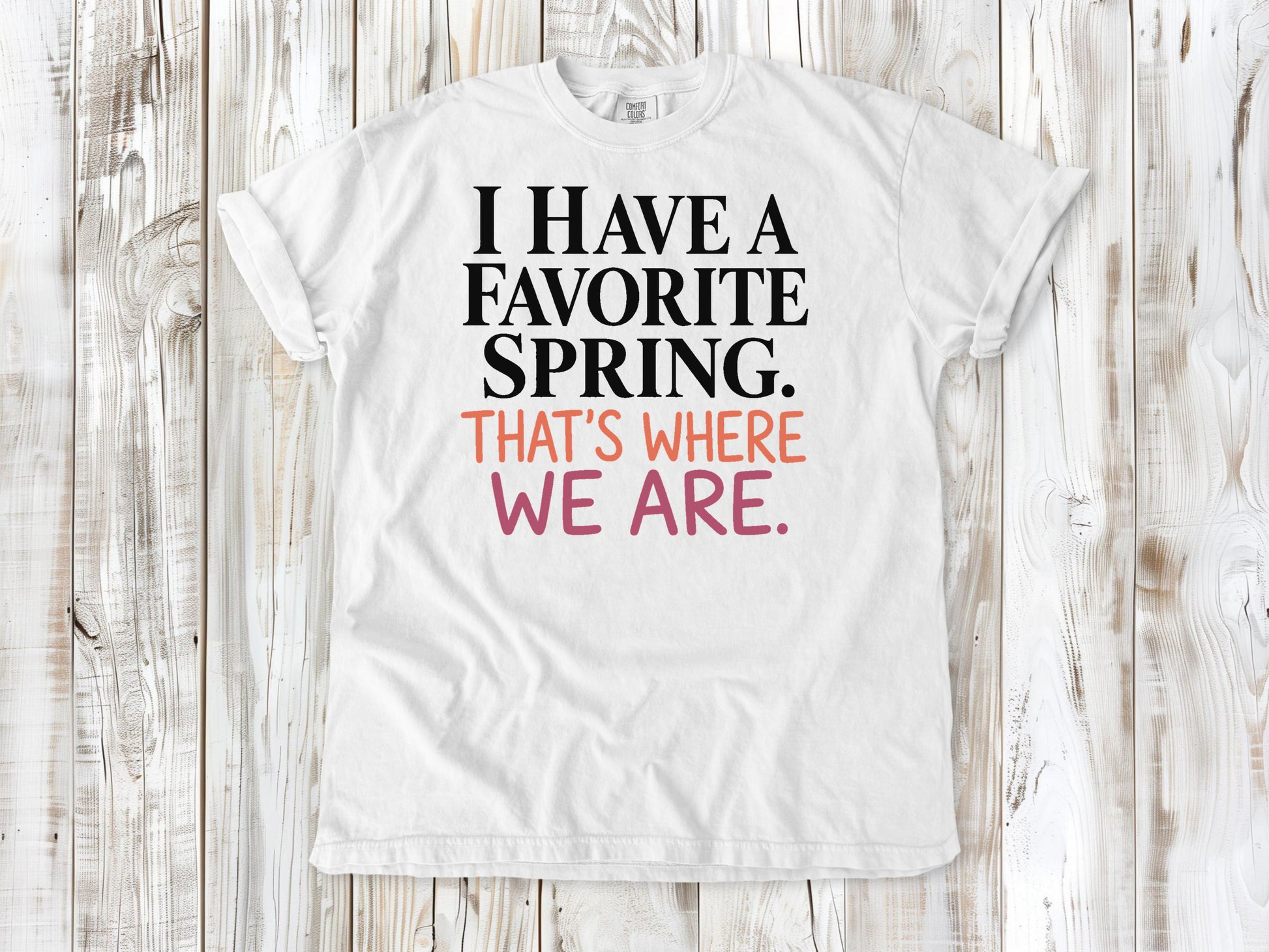 White garment-dyed tee with I Have a Favorite Spring reformer Pilates graphic.