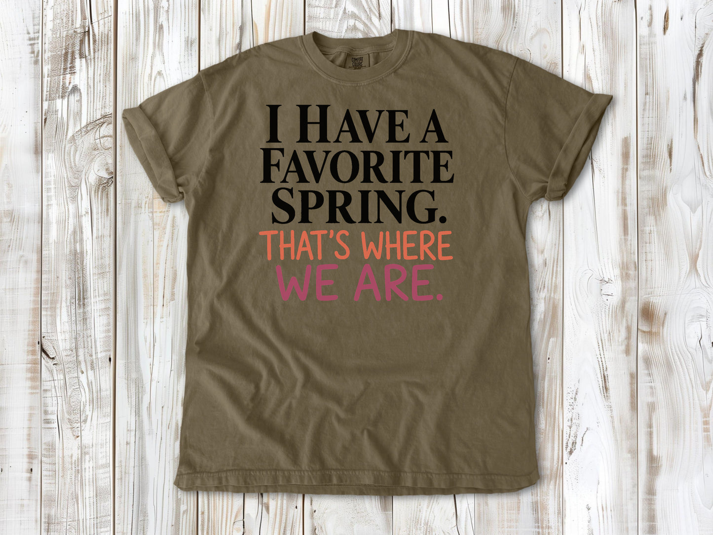 Khaki garment-dyed tee with I Have a Favorite Spring reformer Pilates graphic.
