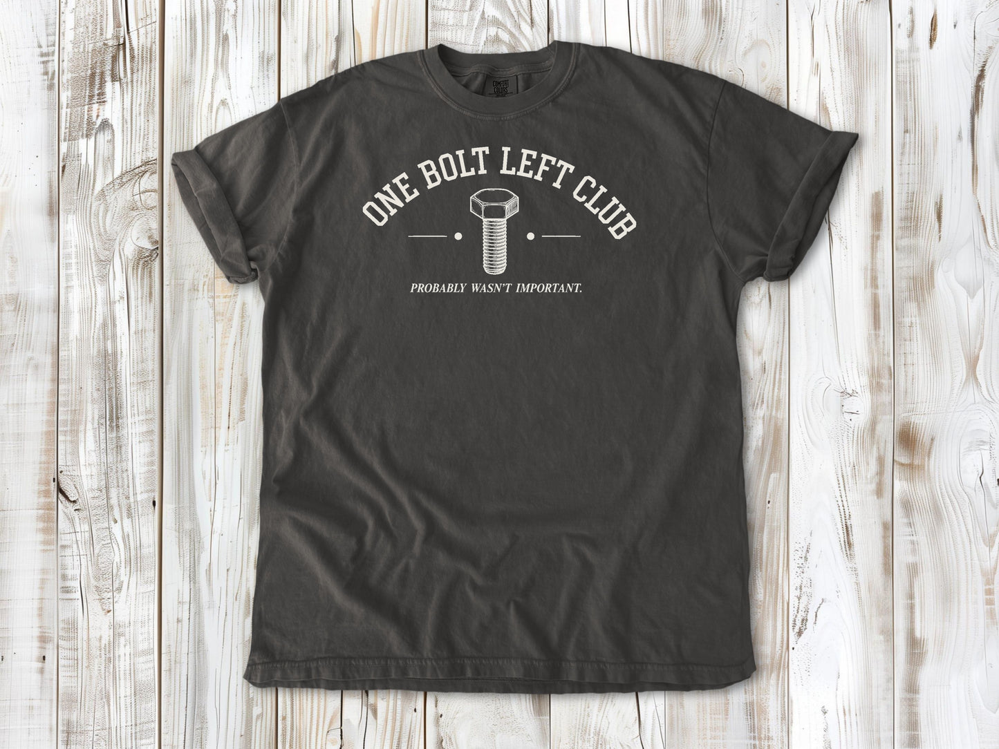 Pepper garment-dyed tee with One Bolt Left Club mechanic humor graphic.