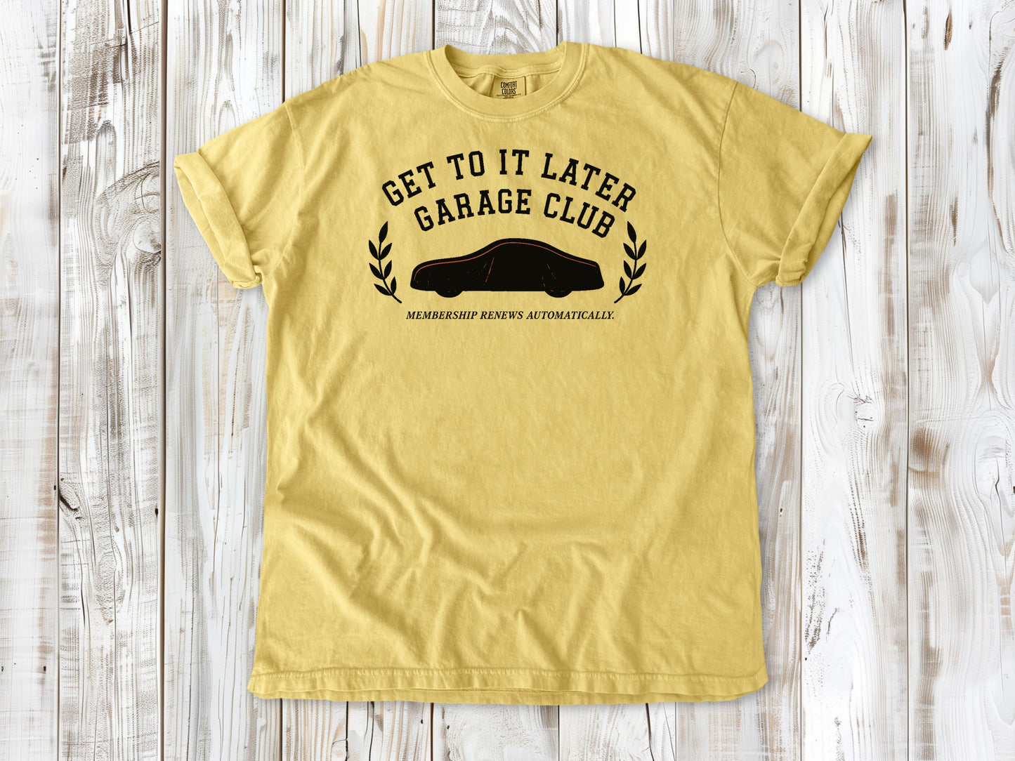 Butter garment-dyed tee with Get to It Later Garage Club project humor graphic.