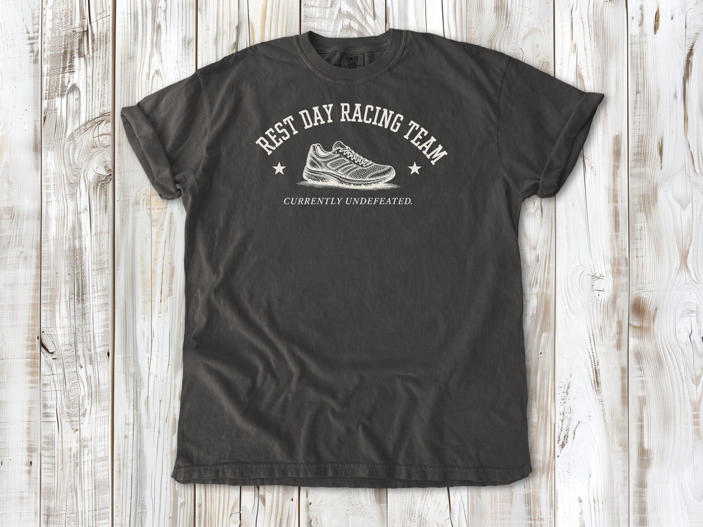 Pepper garment-dyed tee with Rest Day Racing Team running humor graphic.