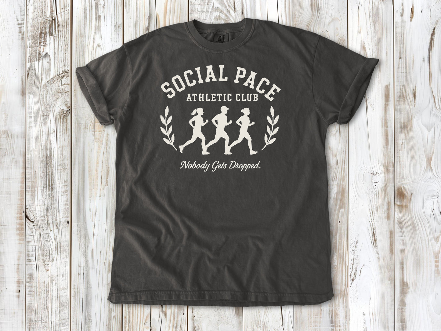 Pepper garment-dyed tee with Social Pace Athletic Club group running graphic.