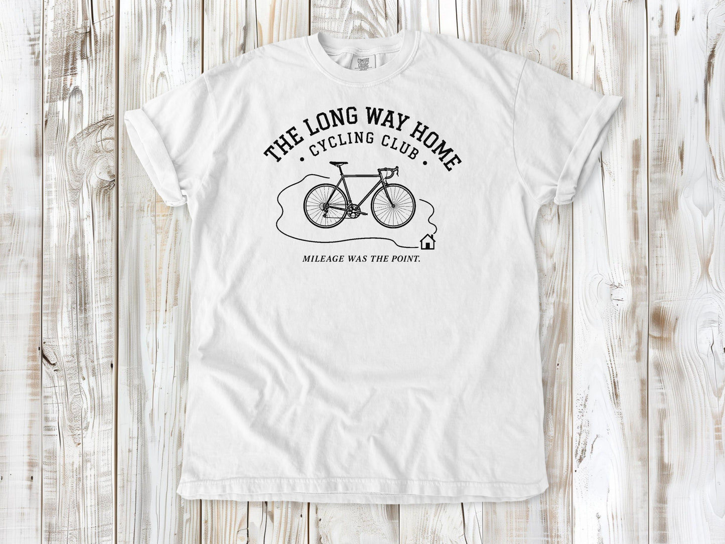 White garment-dyed tee with The Long Way Home Cycling Club bicycle graphic.