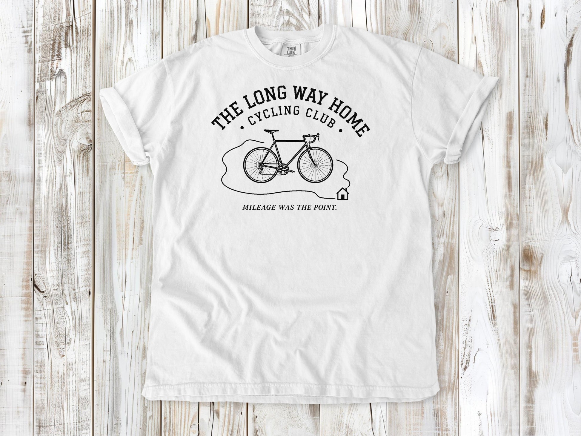 White garment-dyed tee with The Long Way Home Cycling Club bicycle graphic.