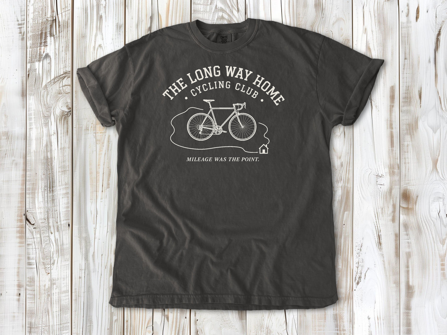 Pepper garment-dyed tee with The Long Way Home Cycling Club bicycle graphic.