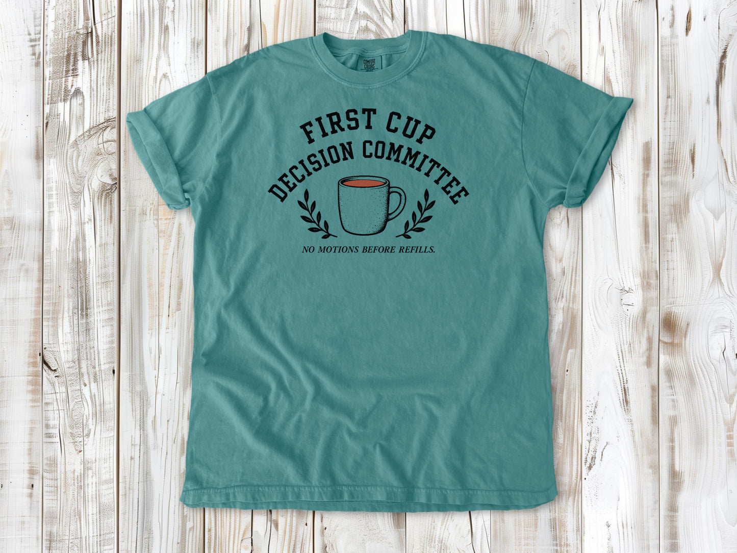 Seafoam garment-dyed tee with First Cup Decision Committee coffee club graphic.