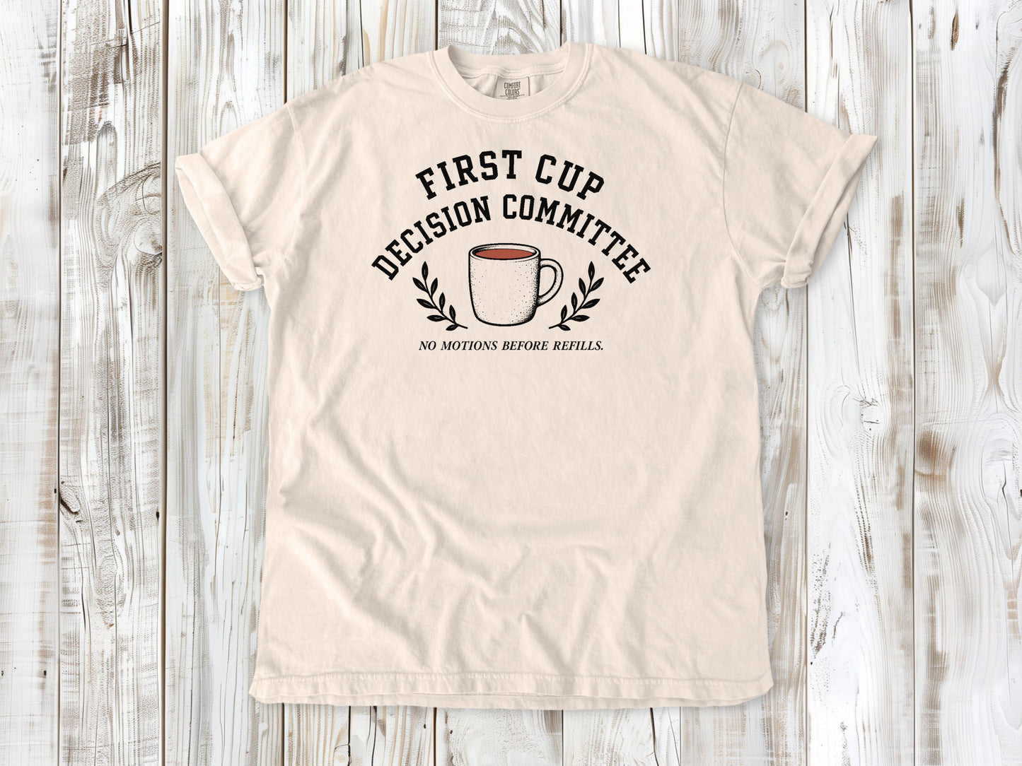 Ivory garment-dyed tee with First Cup Decision Committee coffee club graphic.