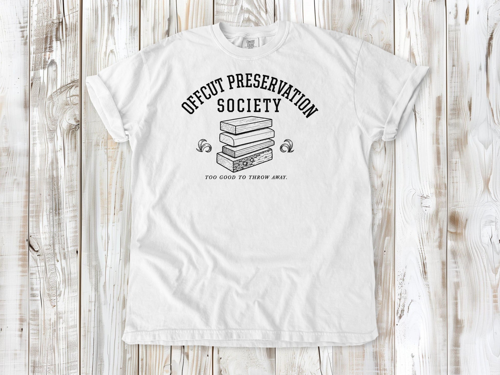 White garment-dyed tee with Offcut Preservation Society woodworking graphic.