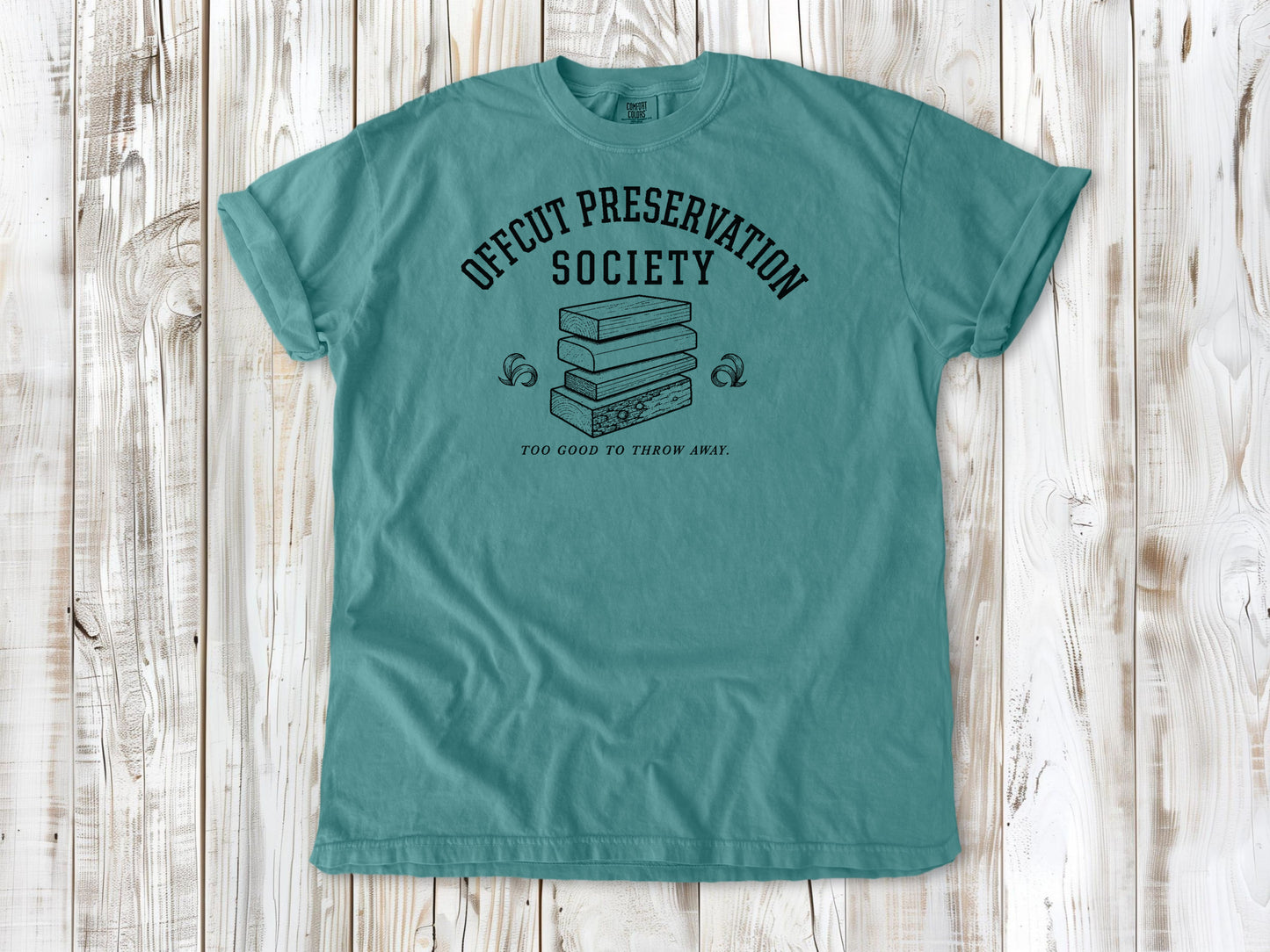 Seafoam garment-dyed tee with Offcut Preservation Society woodworking graphic.