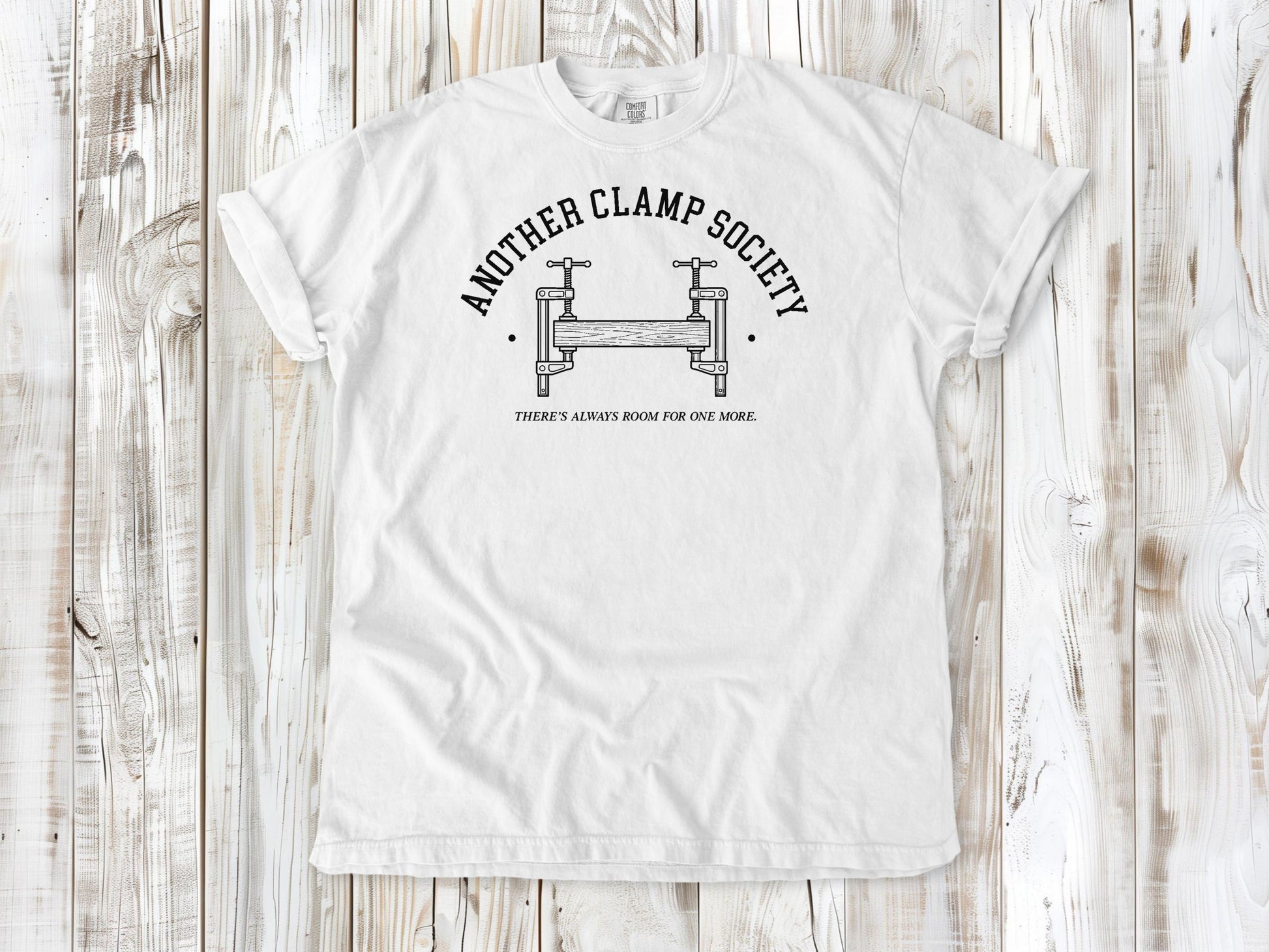 White garment-dyed tee with Another Clamp Society woodworking tools graphic.