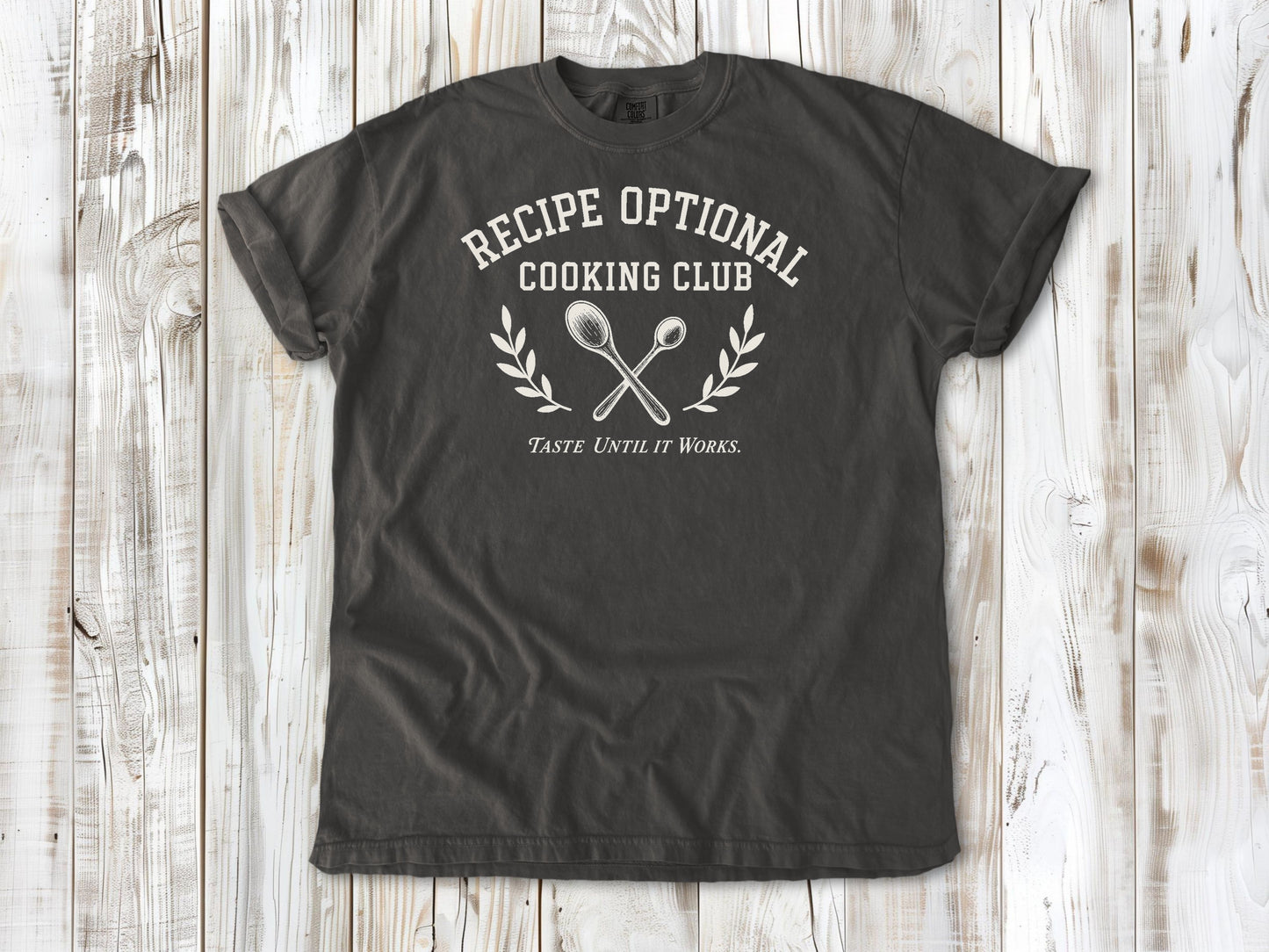 Pepper garment-dyed tee with Recipe Optional Cooking Club kitchen graphic.