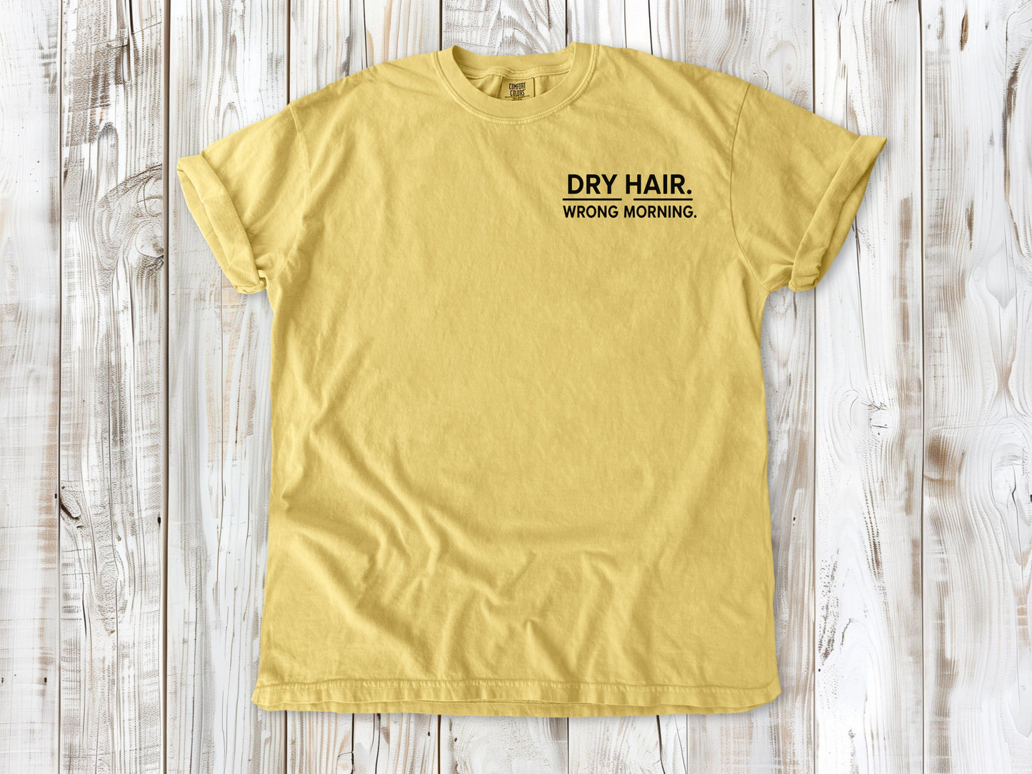 Butter garment-dyed tee with Dry Hair Wrong Morning small left-chest surf graphic.