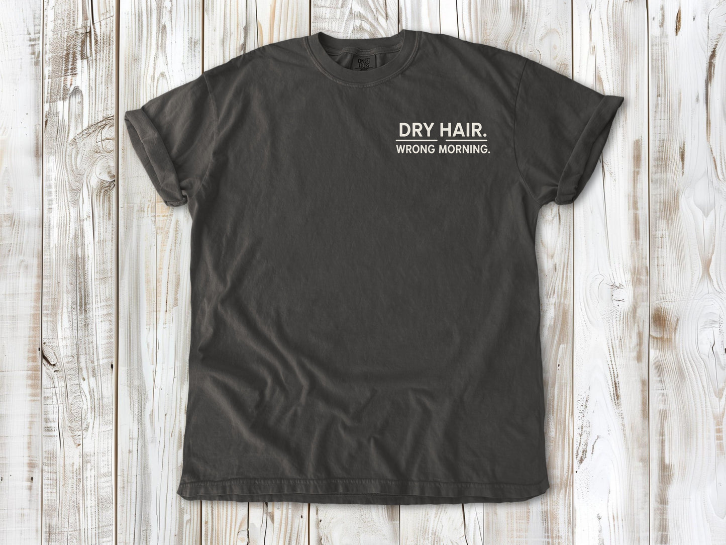 Pepper garment-dyed tee with Dry Hair Wrong Morning small left-chest surf graphic.