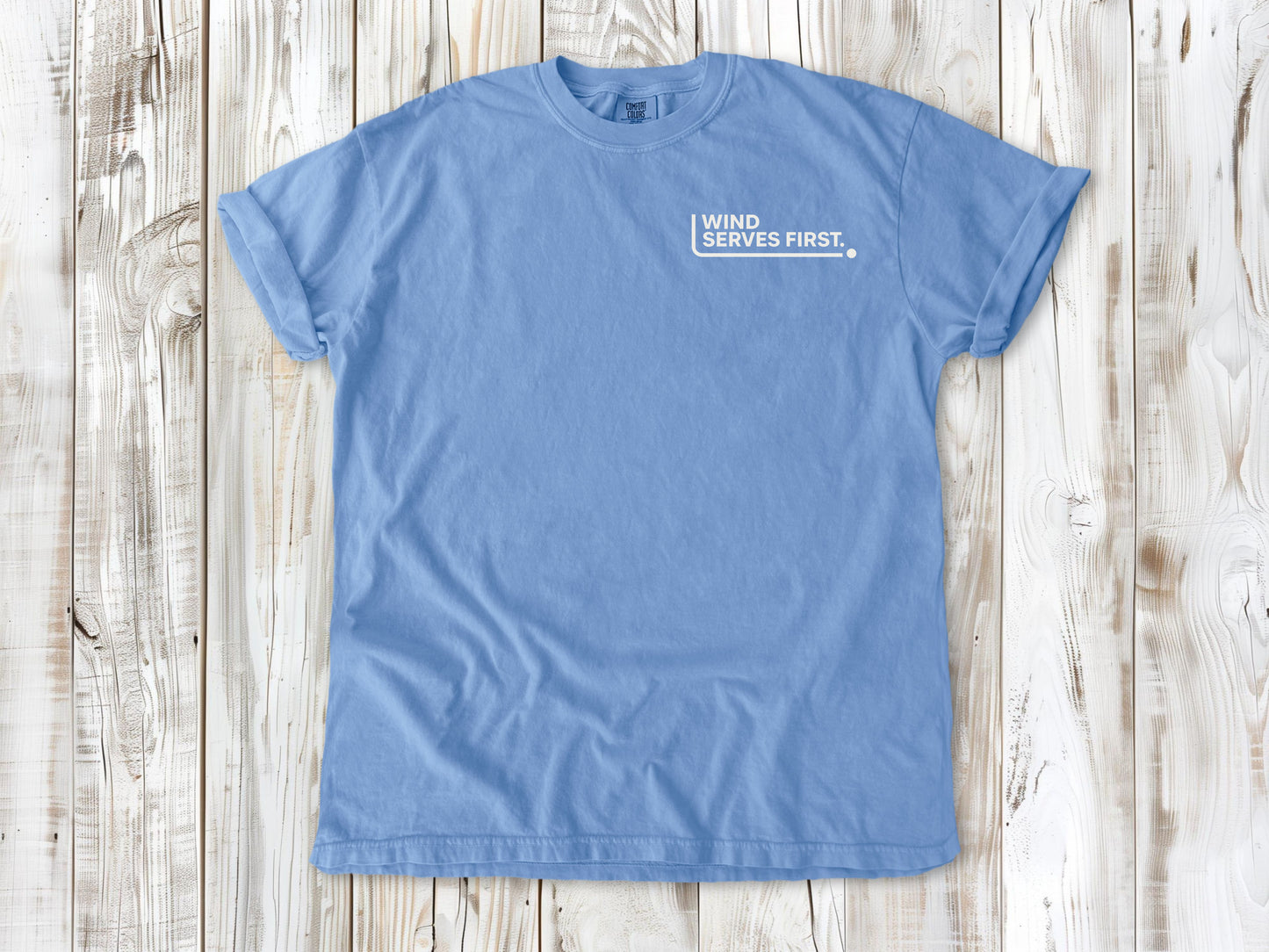 Washed Denim garment-dyed tee with Wind Serves First small left-chest beach volleyball graphic.