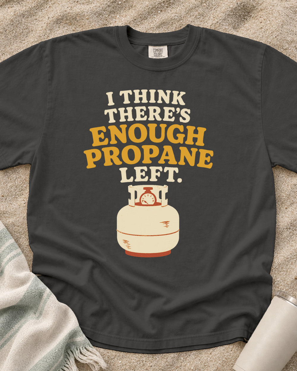 Pepper garment-dyed tee with I Think There’s Enough Propane Left griddle graphic.