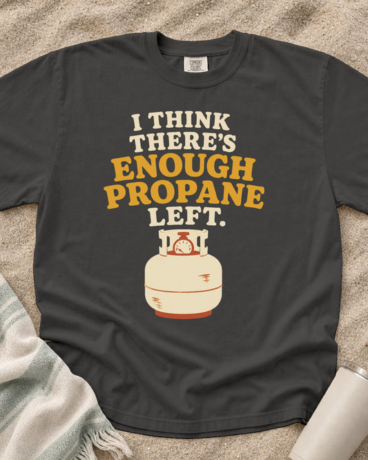 Pepper garment-dyed tee with I Think There’s Enough Propane Left griddle graphic.