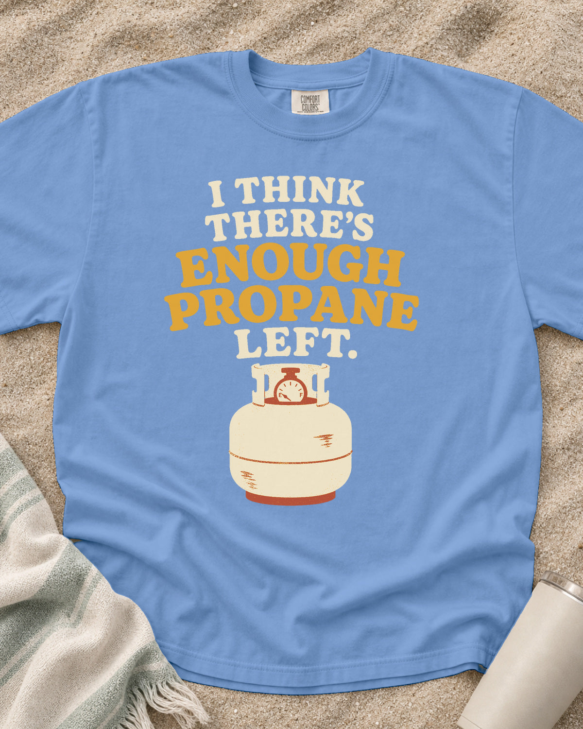 Washed Denim garment-dyed tee with I Think There’s Enough Propane Left griddle graphic.