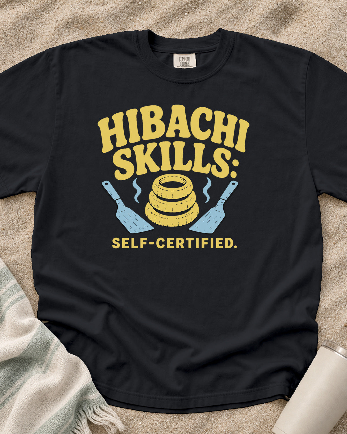 Graphite garment-dyed tee with Hibachi Skills Self-Certified griddle graphic.