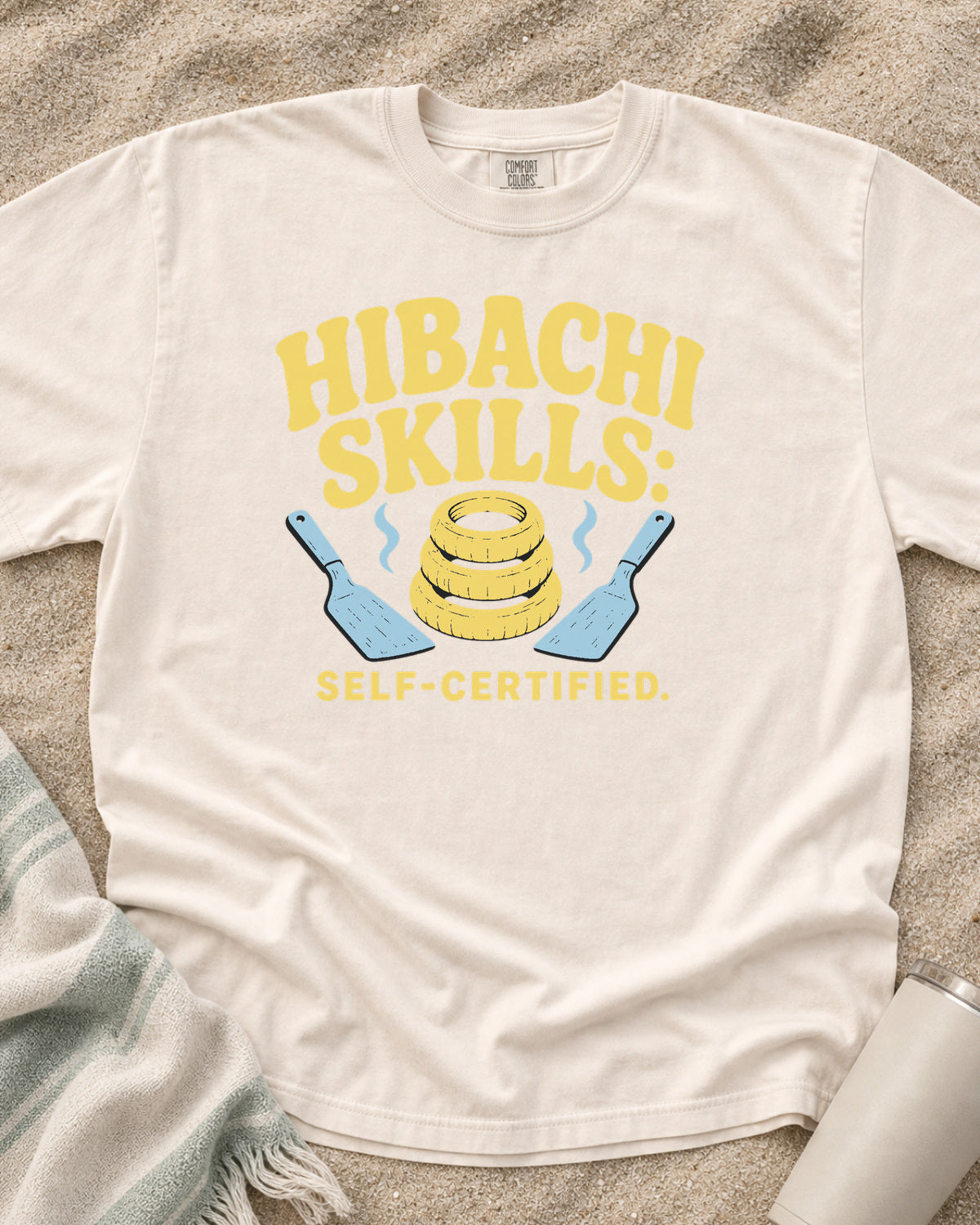 Ivory garment-dyed tee with Hibachi Skills Self-Certified griddle graphic.