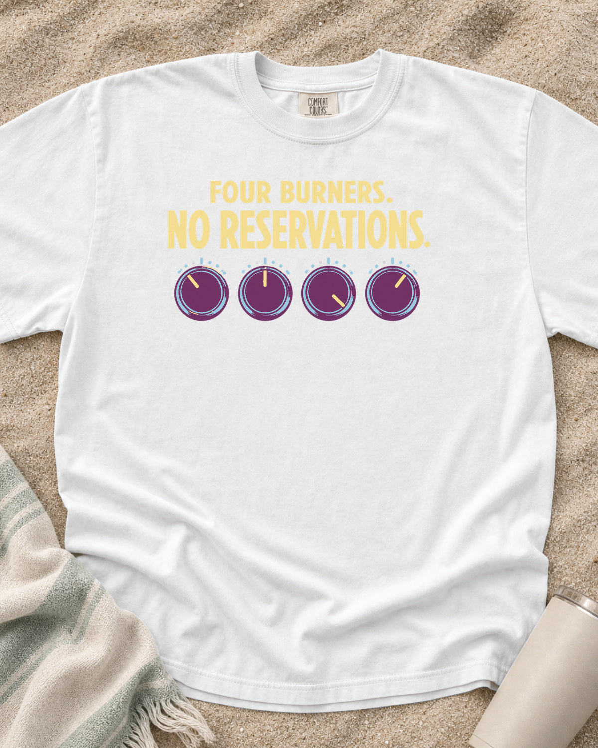 White garment-dyed tee with Four Burners No Reservations griddle graphic.