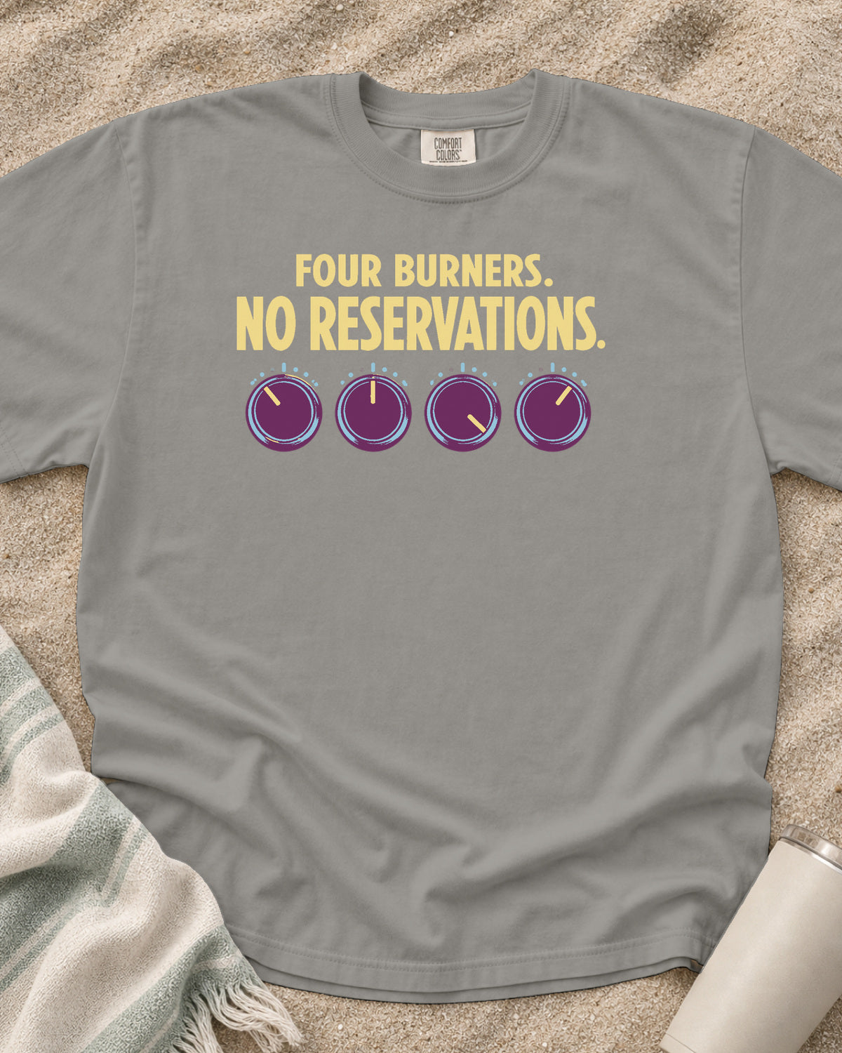 Grey garment-dyed tee with Four Burners No Reservations griddle graphic.