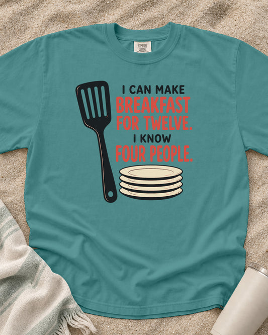 Seafoam garment-dyed tee with I Can Make Breakfast for Twelve griddle graphic.