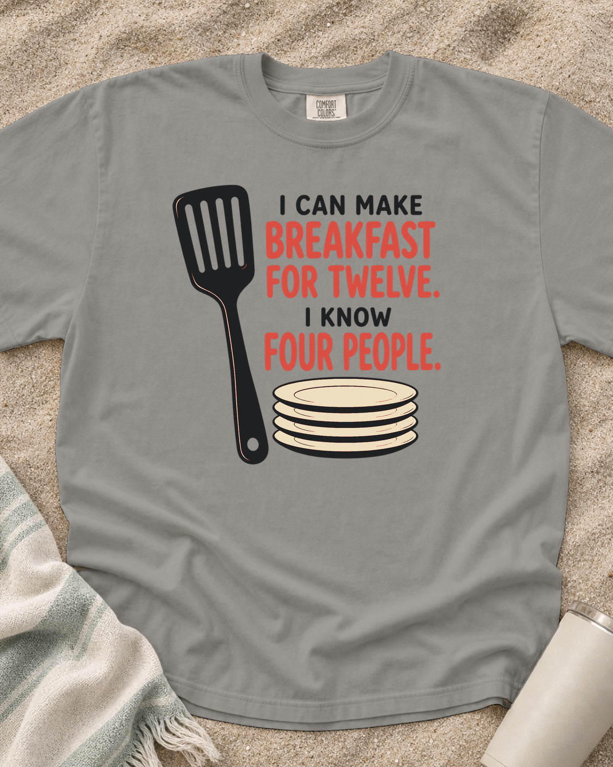 Grey garment-dyed tee with I Can Make Breakfast for Twelve griddle graphic.