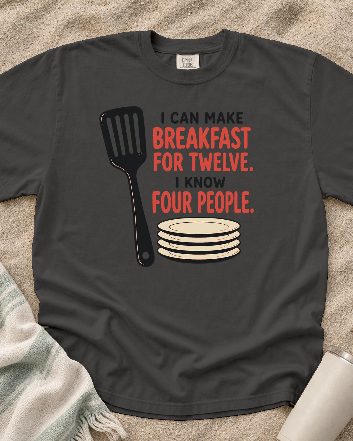 Pepper garment-dyed tee with I Can Make Breakfast for Twelve griddle graphic.