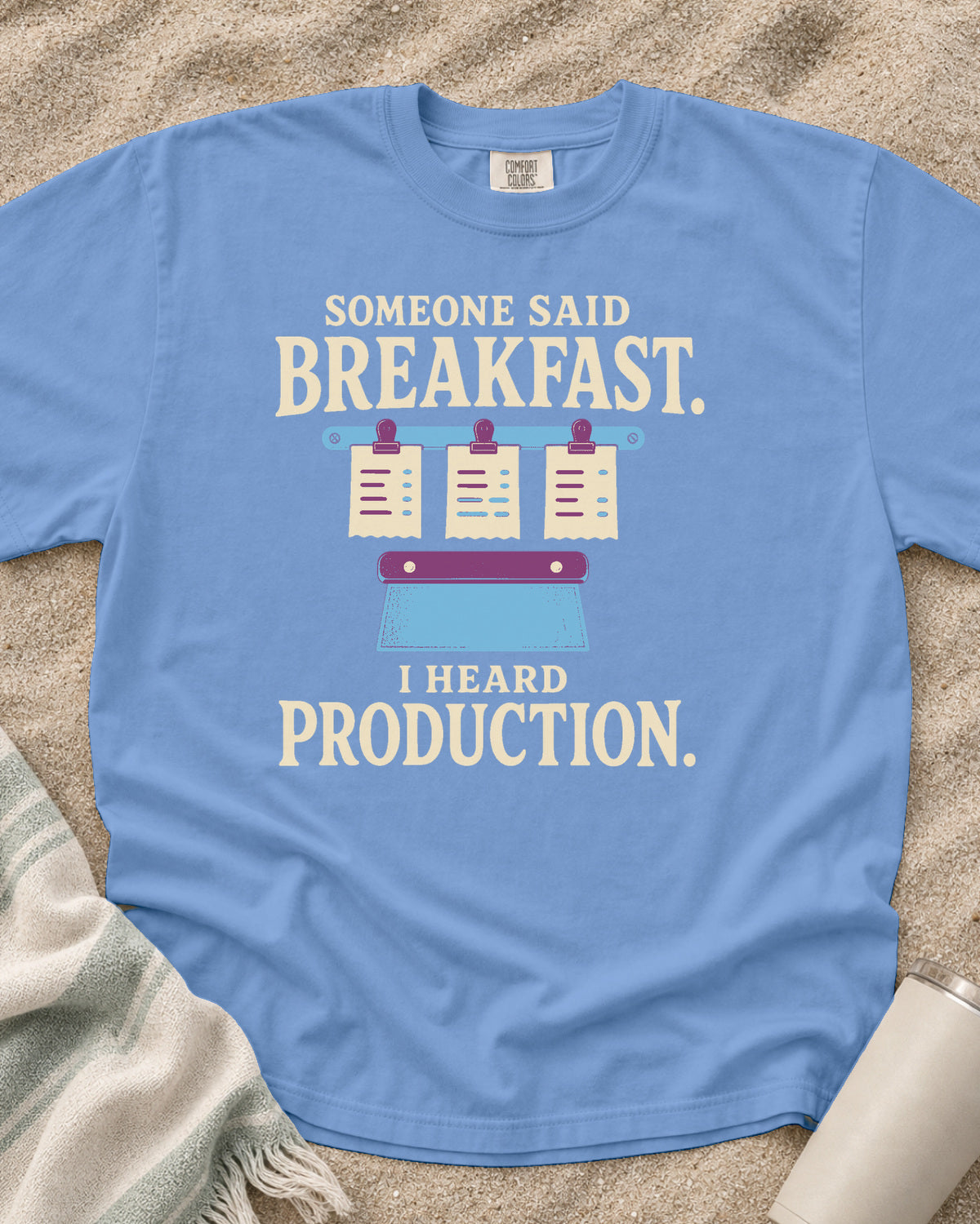 Washed Denim garment-dyed tee with Someone Said Breakfast I Heard Production graphic.