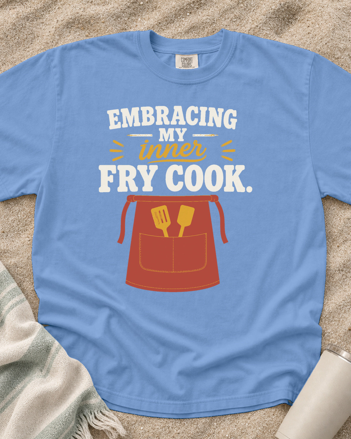 Washed Denim garment-dyed tee with Embracing My Inner Fry Cook griddle graphic.