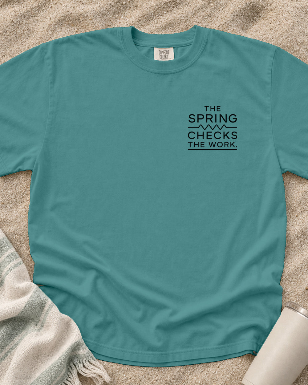 Seafoam Comfort Colors 1717 tee with The Spring Checks the Work graphic.