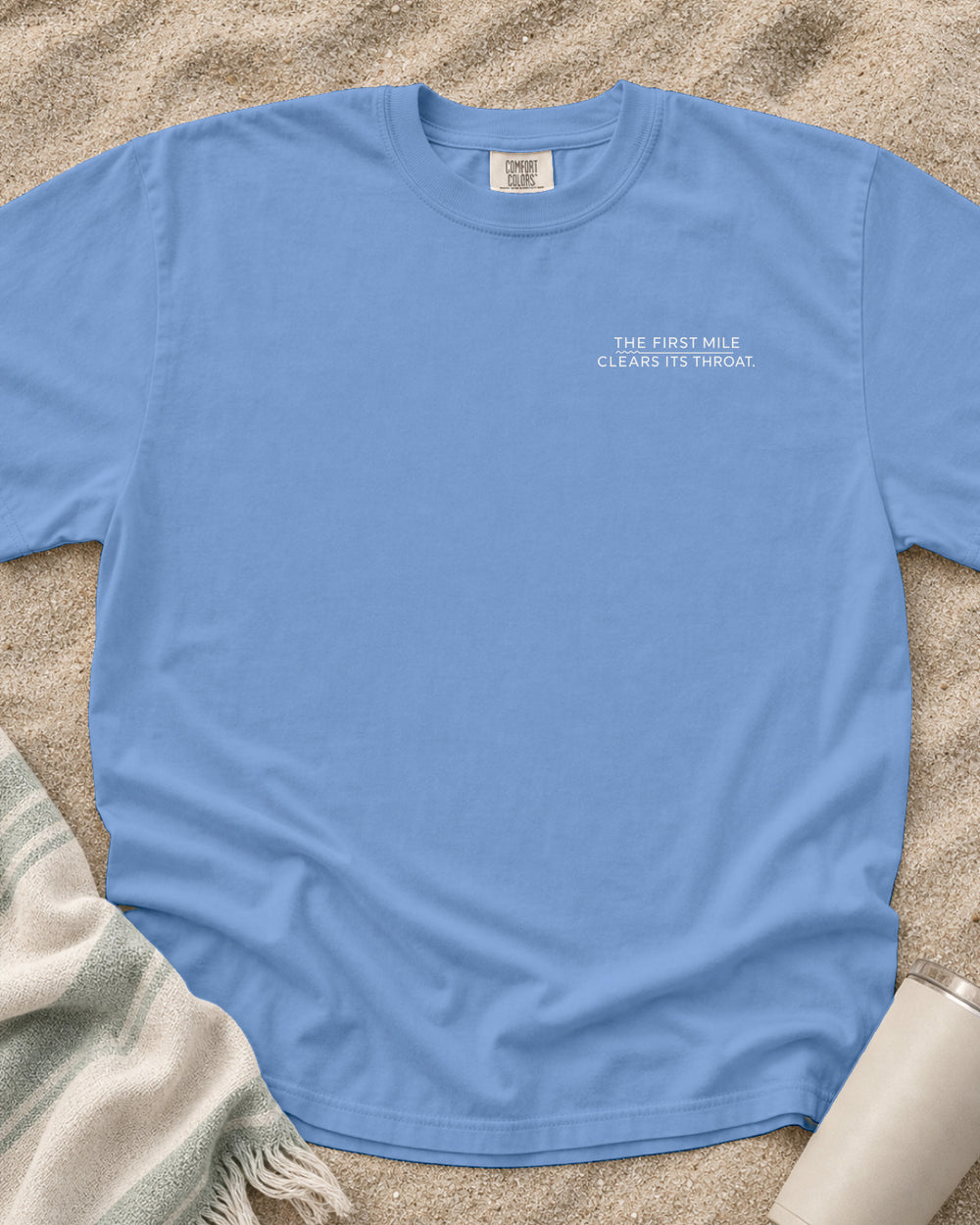 Washed Denim Comfort Colors 1717 tee with The First Mile Clears Its Throat graphic.