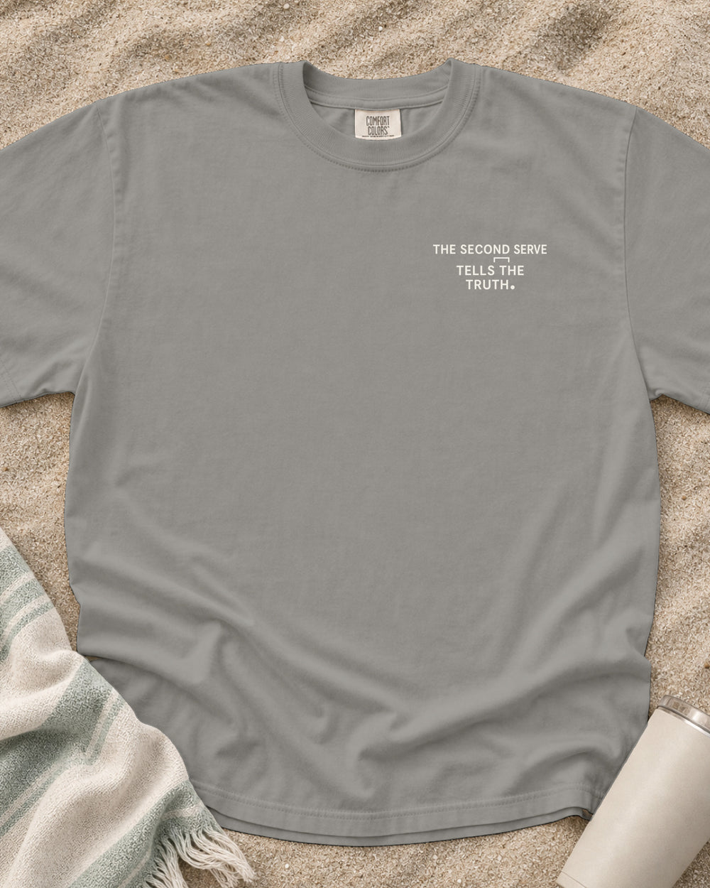 Grey Comfort Colors 1717 tee with The Second Serve Tells the Truth graphic.