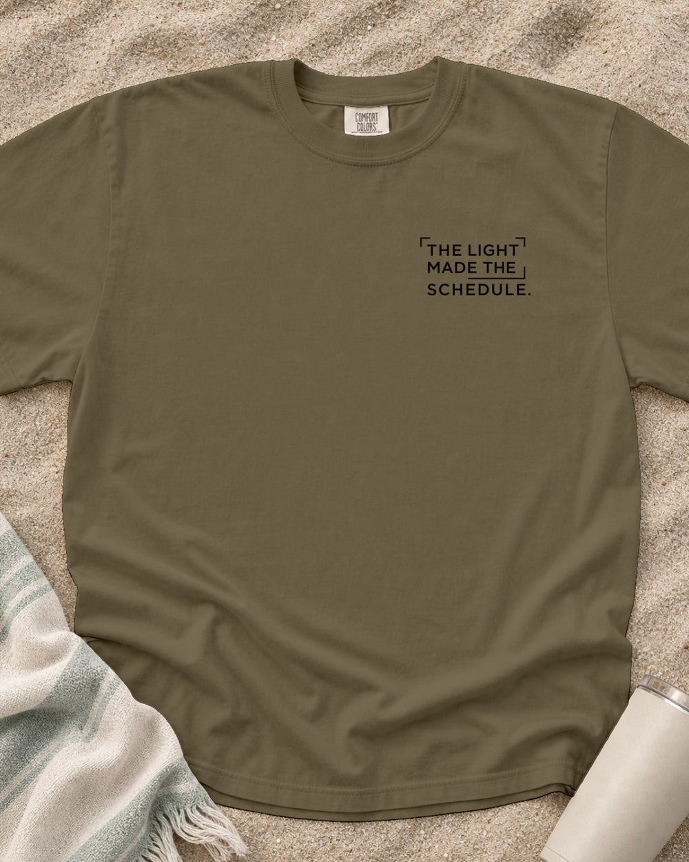 Khaki Comfort Colors 1717 tee with The Light Made the Schedule graphic.