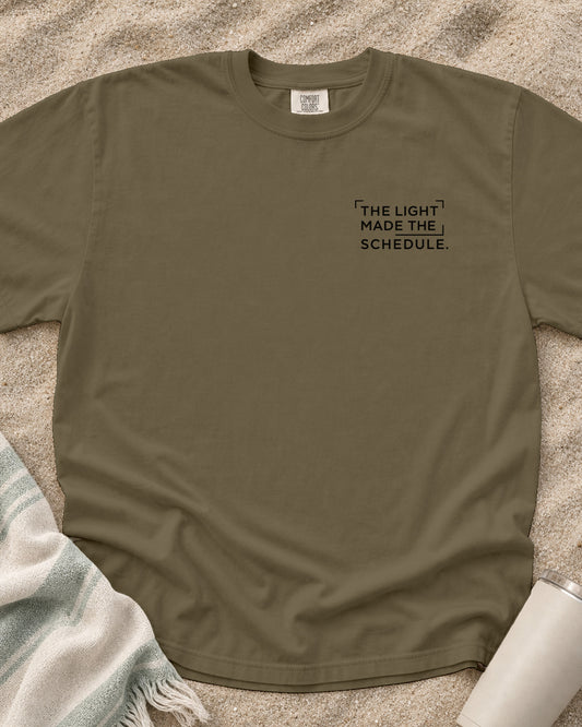 Khaki Comfort Colors 1717 tee with The Light Made the Schedule graphic.