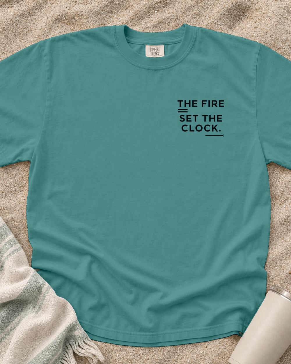 Seafoam Comfort Colors 1717 tee with The Fire Set the Clock graphic.