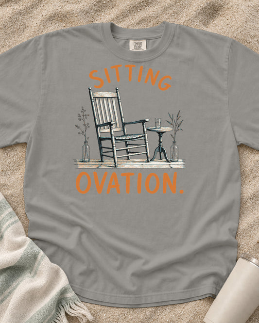 Grey Comfort Colors 1717 tee with Sitting Ovation graphic.