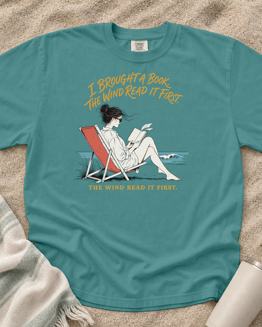 Seafoam Comfort Colors 1717 tee with I Brought a Book. The Wind Read It First graphic.