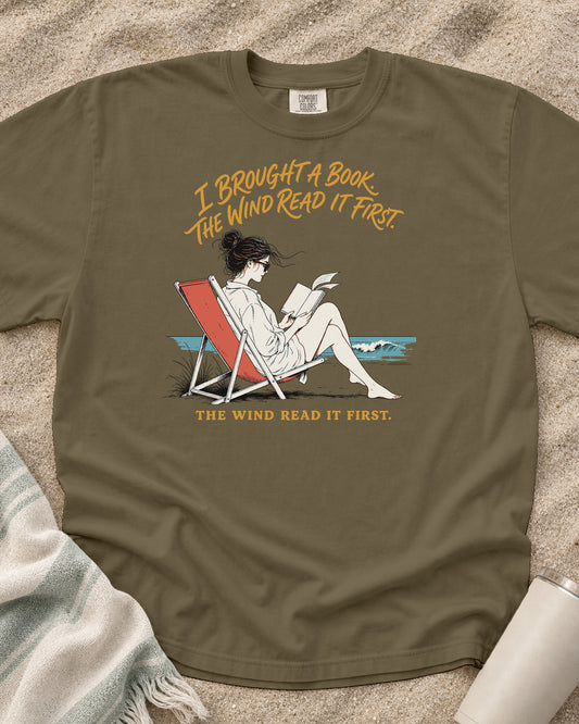 Khaki Comfort Colors 1717 tee with I Brought a Book. The Wind Read It First graphic.