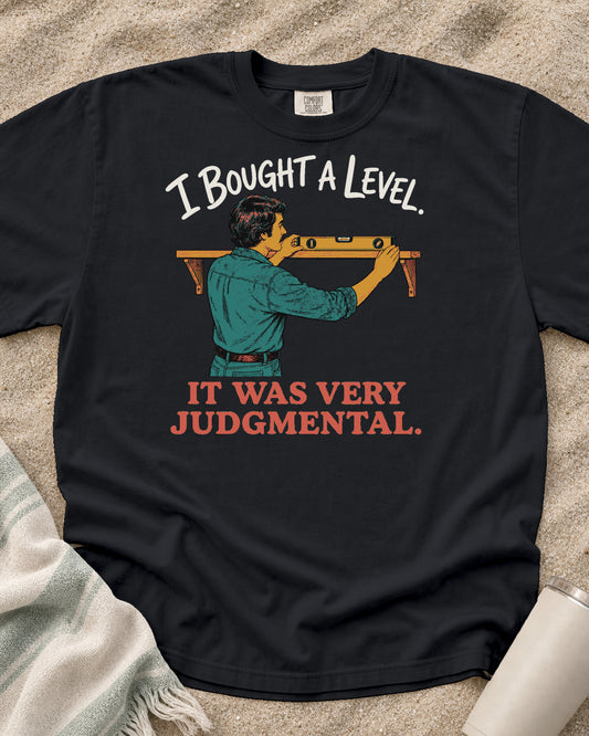 Graphite Comfort Colors 1717 tee with I Bought a Level. It Was Very Judgmental graphic.