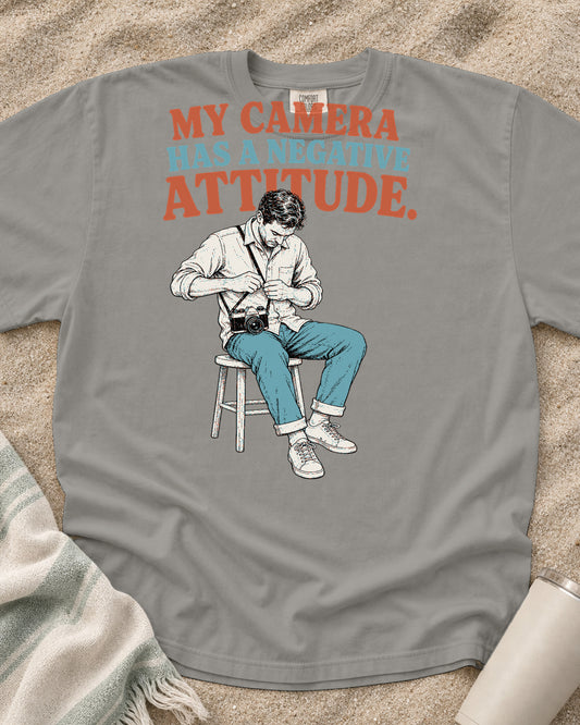 Grey Comfort Colors 1717 tee with My Camera Has a Negative Attitude graphic.