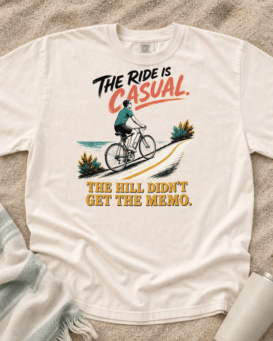 Ivory Comfort Colors 1717 tee with The Ride Is Casual. The Hill Didn't Get the Memo graphic.