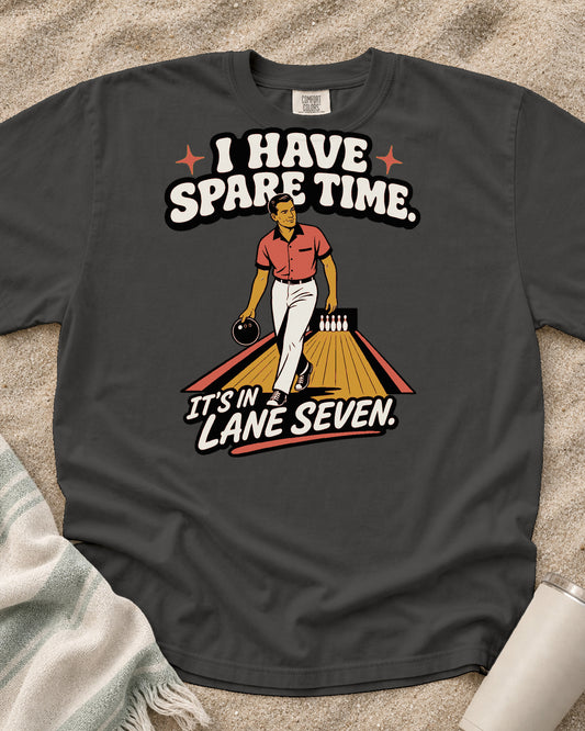Pepper Comfort Colors 1717 tee with I Have Spare Time. It's in Lane Seven graphic.