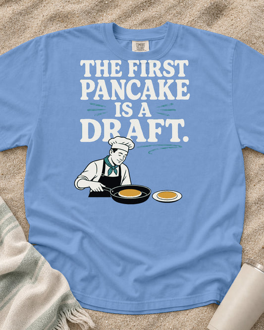 Washed Denim Comfort Colors 1717 tee with The First Pancake Is a Draft graphic.